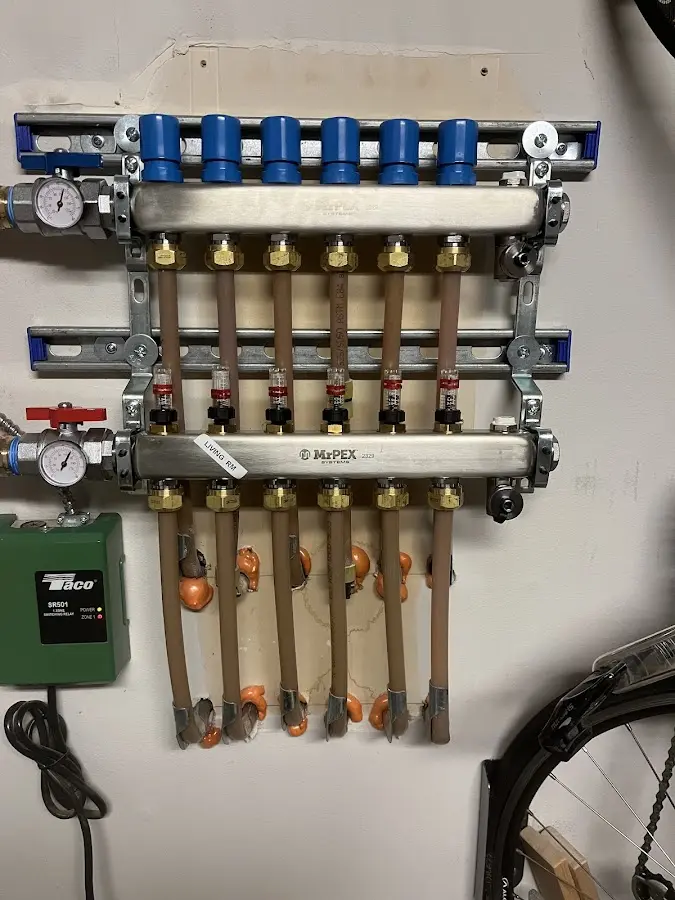 Plumber performing Leak Detection at a residential property in Medford Lakes